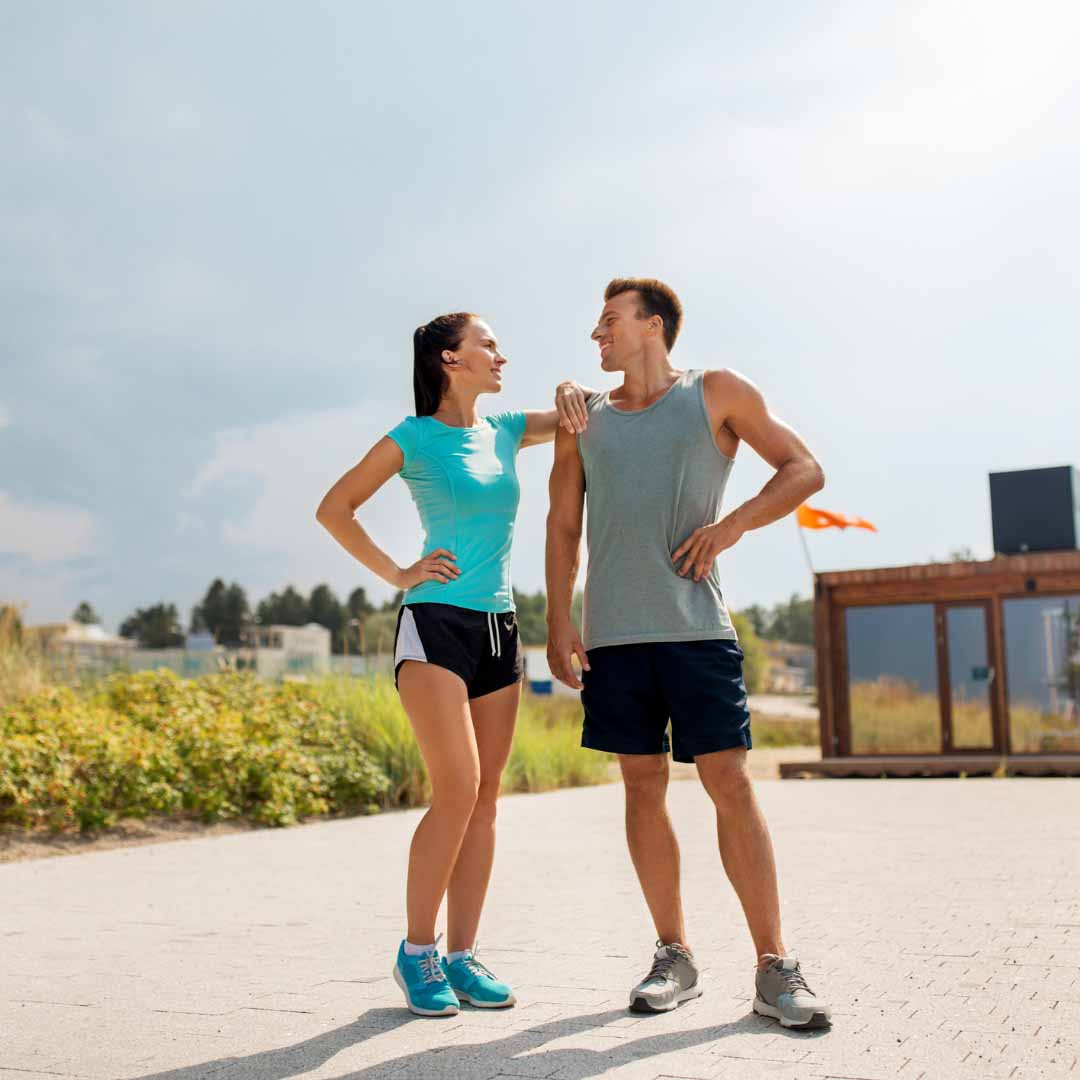 Couple in Sports Clothes Outdoors